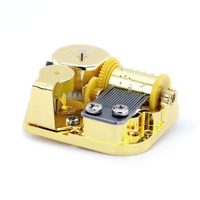 Y 1PC Gold-plated Windup Music - Musical Instrument Brands recension och pris
