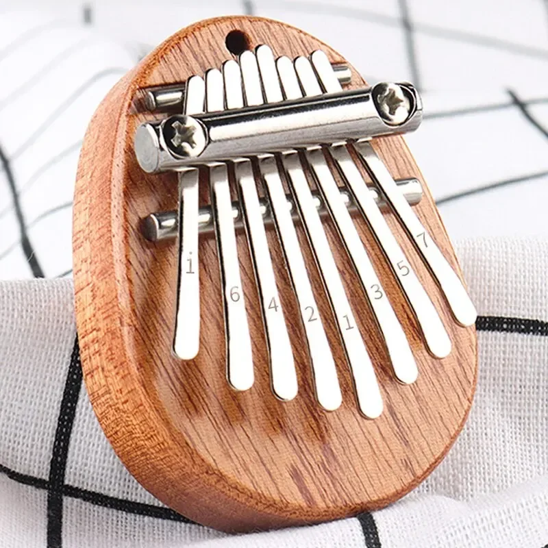 1Pcs Wood Mini Thumb Piano Mus - Musical Instrument For Beginners recension och pris