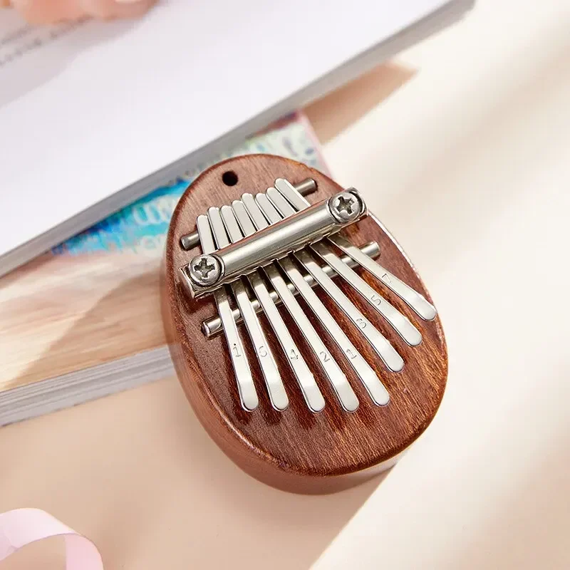 1Pcs Wood Mini Thumb Piano Mus - Musical Instrument For Beginners recension och pris