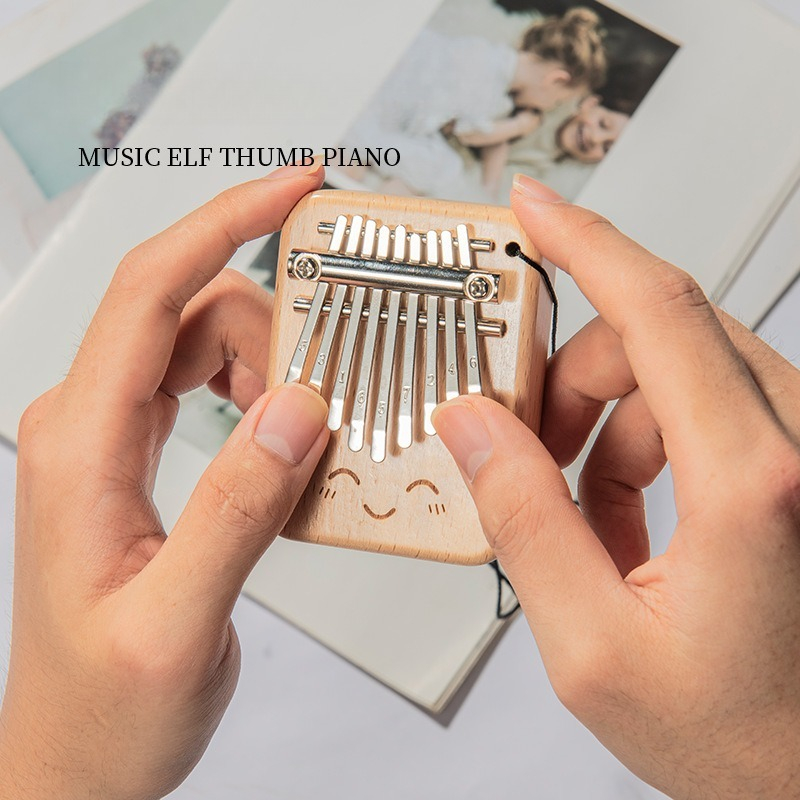Solid Wood 9-tone Mini Thumb P - Musical Instrument For Beginners recension och pris